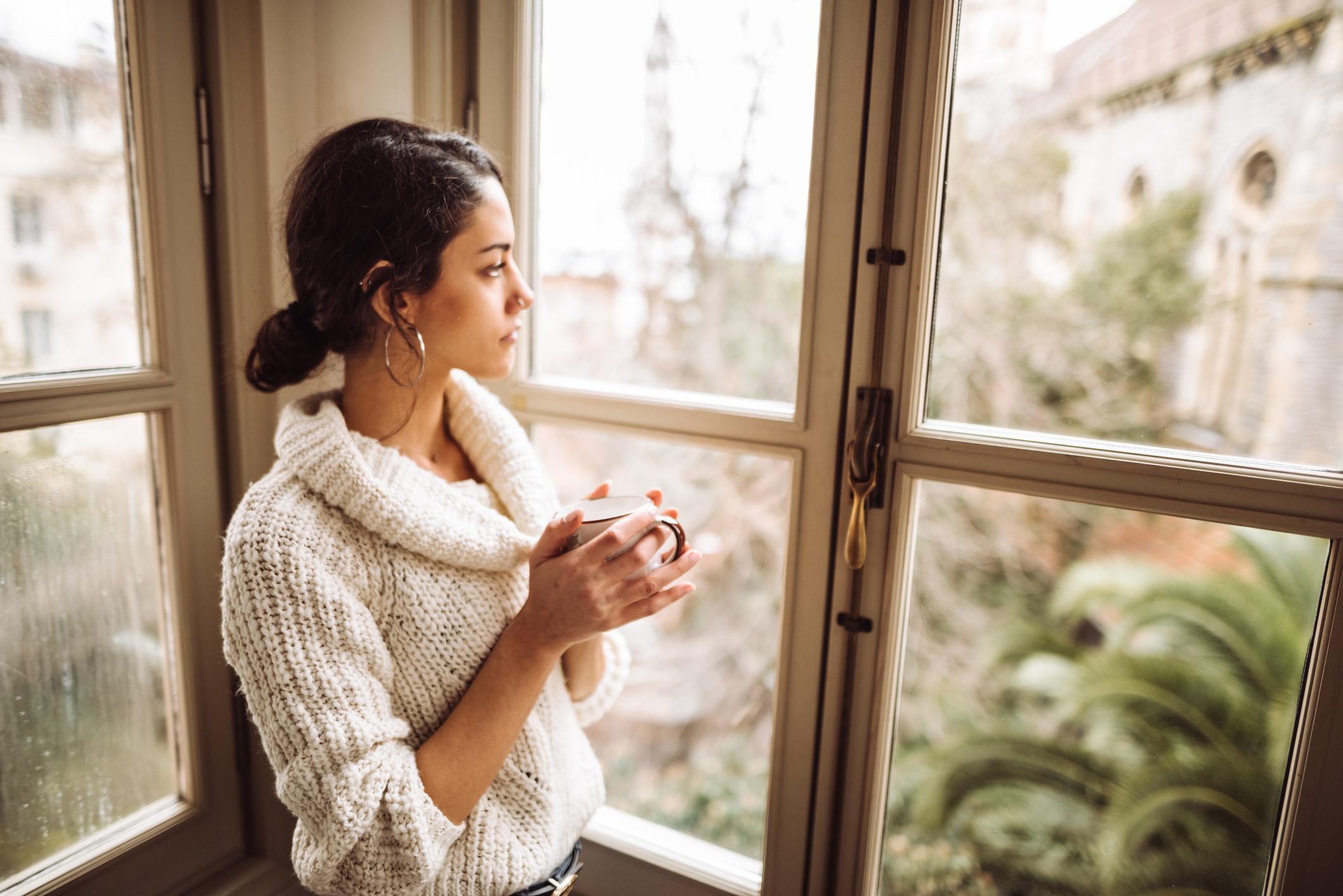 sad woman at home in winter