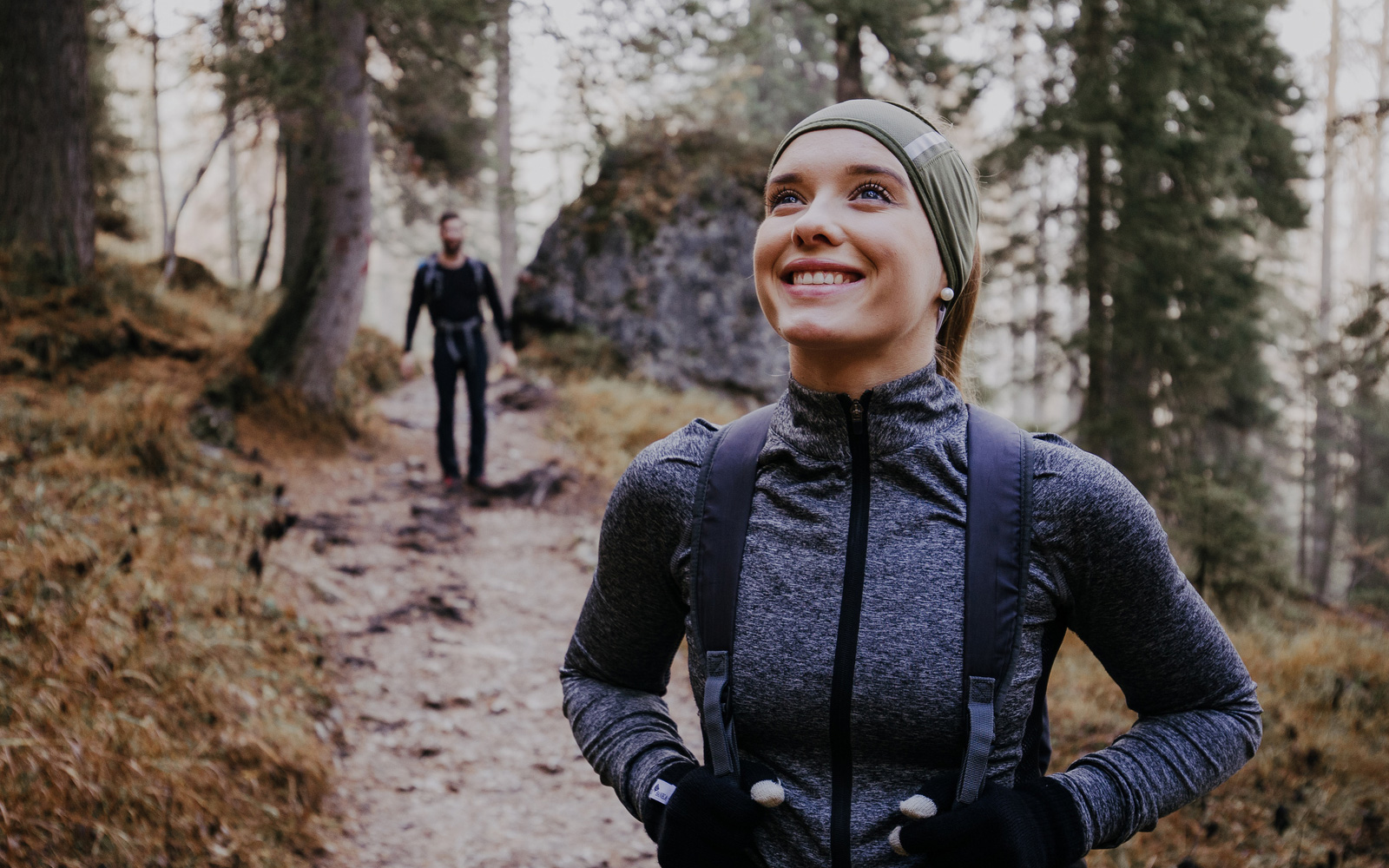 Female smiling on trail walk