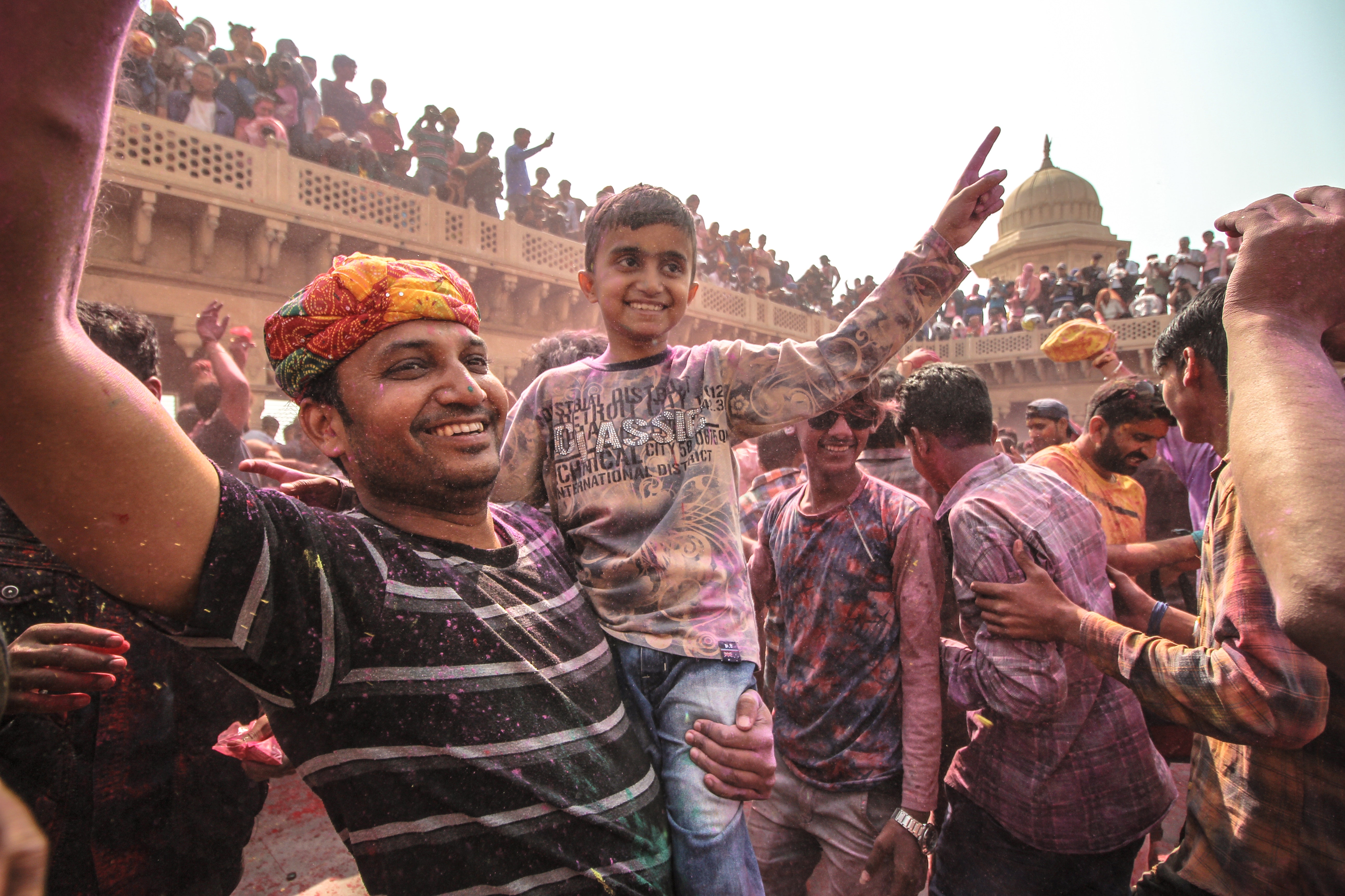 Indian festival father hold son